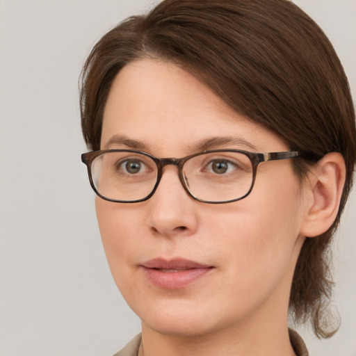 Neutral white young-adult female with medium  brown hair and grey eyes