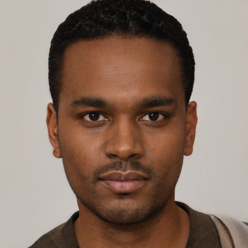 Neutral black young-adult male with short  black hair and brown eyes