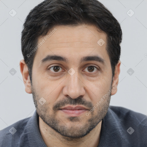 Joyful white young-adult male with short  black hair and brown eyes