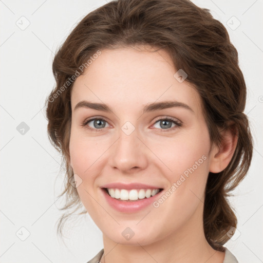 Joyful white young-adult female with medium  brown hair and green eyes