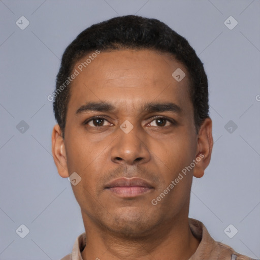 Neutral latino young-adult male with short  black hair and brown eyes