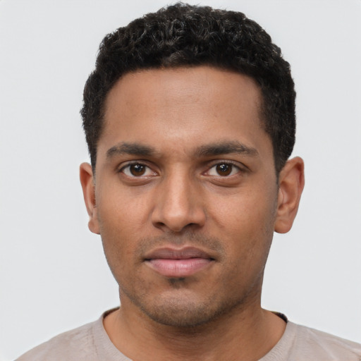 Neutral black young-adult male with short  black hair and brown eyes