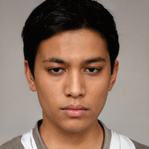 Neutral white young-adult male with short  black hair and brown eyes