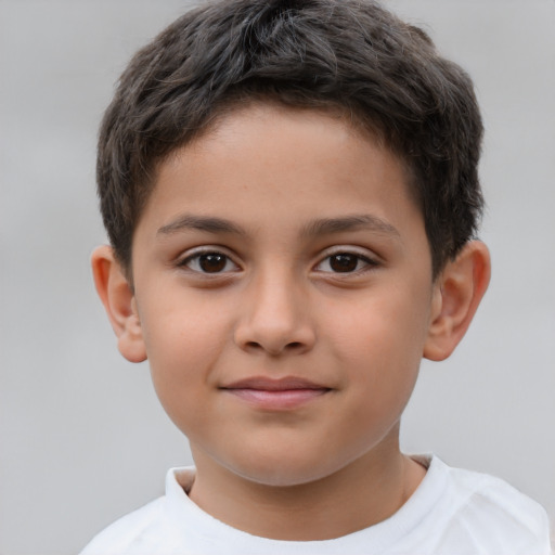 Joyful white child male with short  brown hair and brown eyes