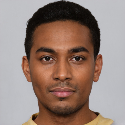 Neutral black young-adult male with short  black hair and brown eyes