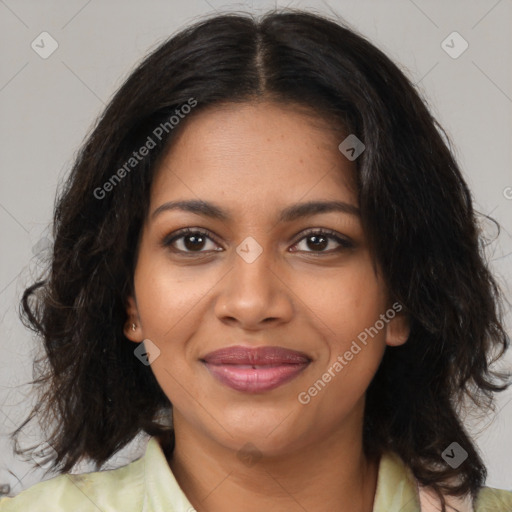 Joyful black young-adult female with medium  brown hair and brown eyes