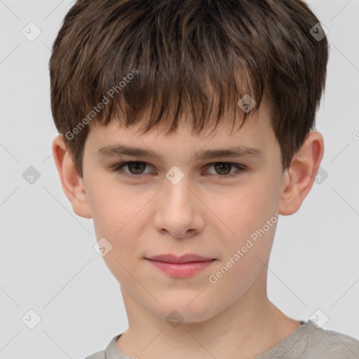 Joyful white child male with short  brown hair and brown eyes