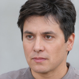 Neutral white adult male with short  brown hair and brown eyes