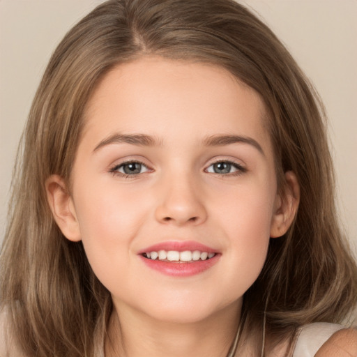 Joyful white child female with long  brown hair and brown eyes