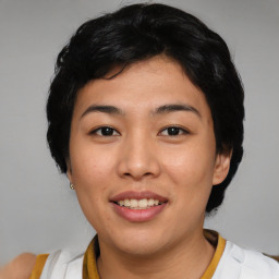 Joyful asian young-adult female with short  black hair and brown eyes