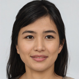 Joyful asian young-adult female with medium  brown hair and brown eyes