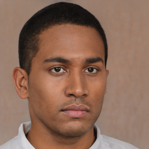 Neutral latino young-adult male with short  brown hair and brown eyes