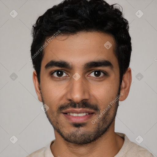 Joyful latino young-adult male with short  black hair and brown eyes