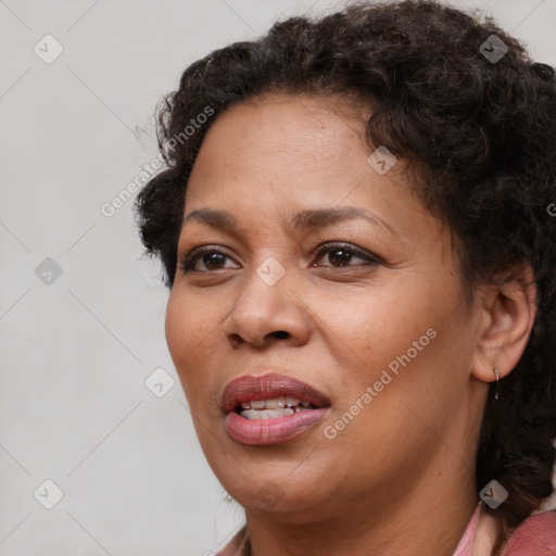 Joyful white adult female with short  brown hair and brown eyes
