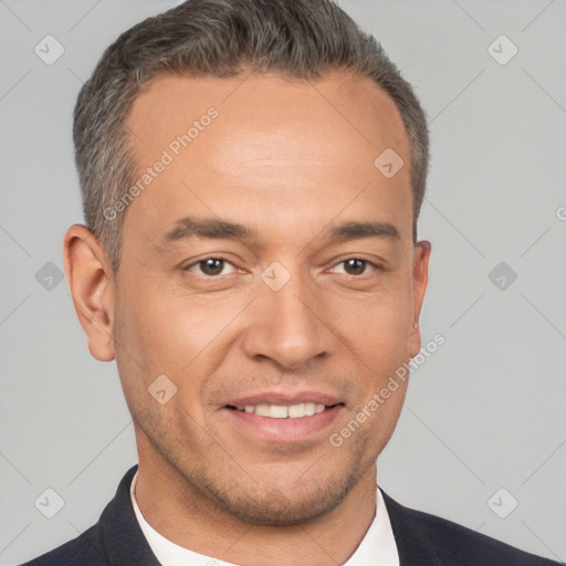 Joyful white adult male with short  brown hair and brown eyes