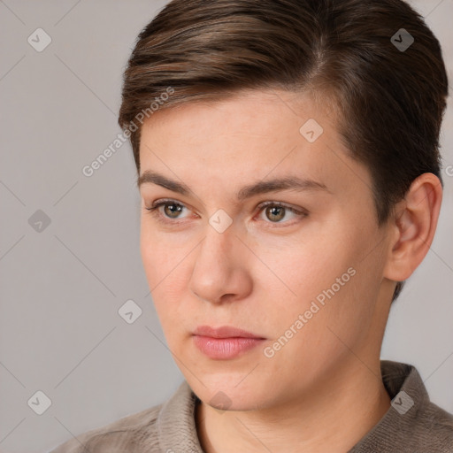 Neutral white young-adult female with short  brown hair and brown eyes