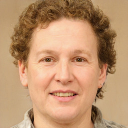 Joyful white adult male with short  brown hair and grey eyes