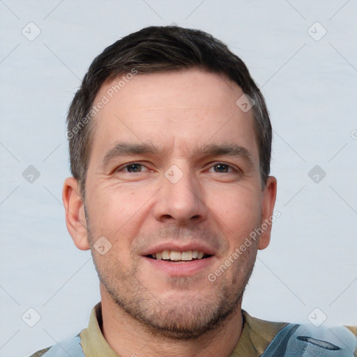 Joyful white young-adult male with short  brown hair and brown eyes