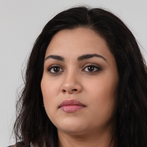 Neutral latino young-adult female with long  black hair and brown eyes