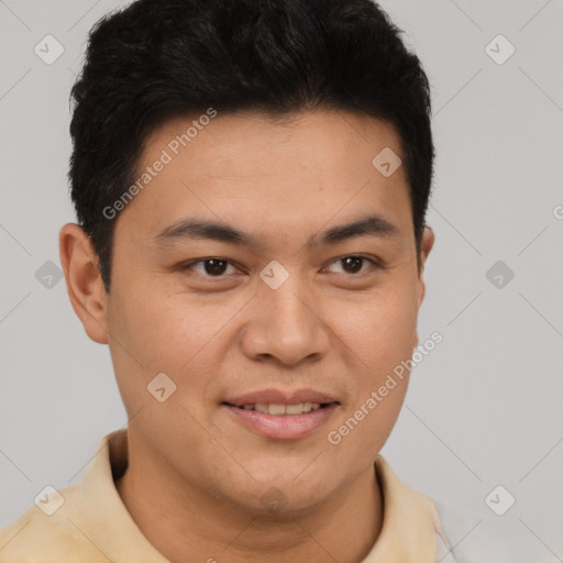 Joyful latino young-adult male with short  brown hair and brown eyes