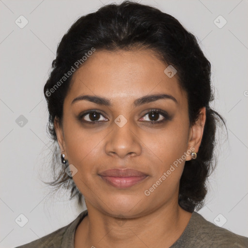 Joyful latino young-adult female with short  black hair and brown eyes