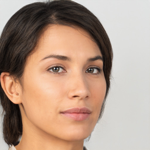 Neutral white young-adult female with medium  brown hair and brown eyes