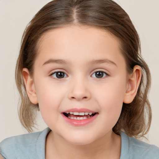 Joyful white child female with medium  brown hair and brown eyes