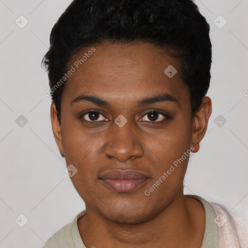 Joyful black young-adult female with short  black hair and brown eyes