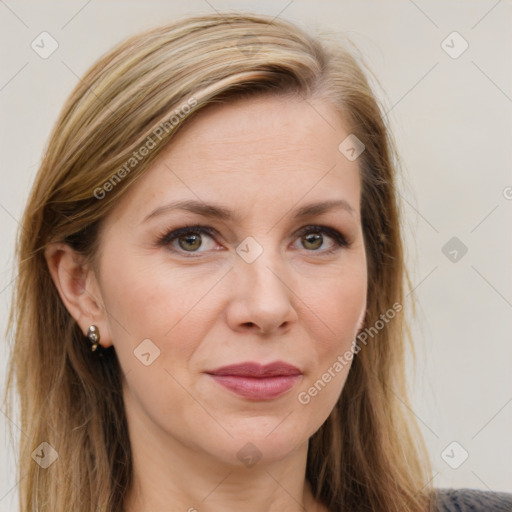 Joyful white adult female with long  brown hair and grey eyes