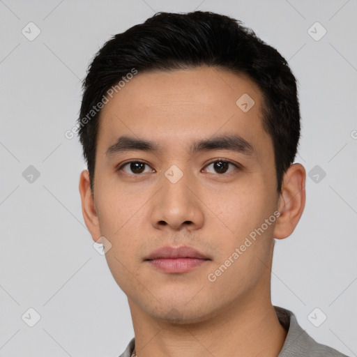 Neutral asian young-adult male with short  black hair and brown eyes