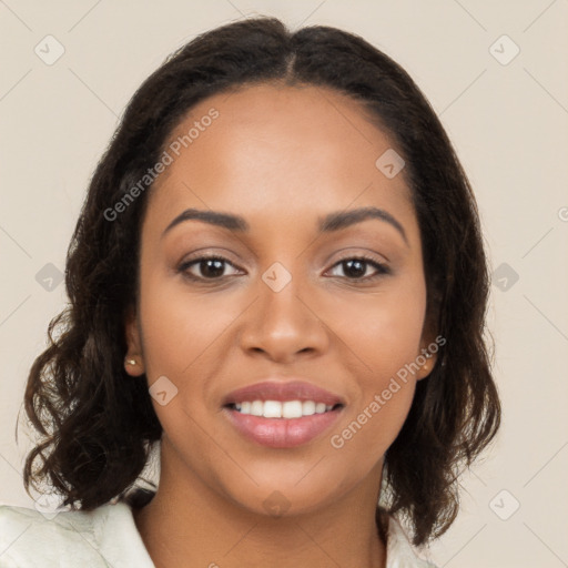 Joyful latino young-adult female with long  brown hair and brown eyes