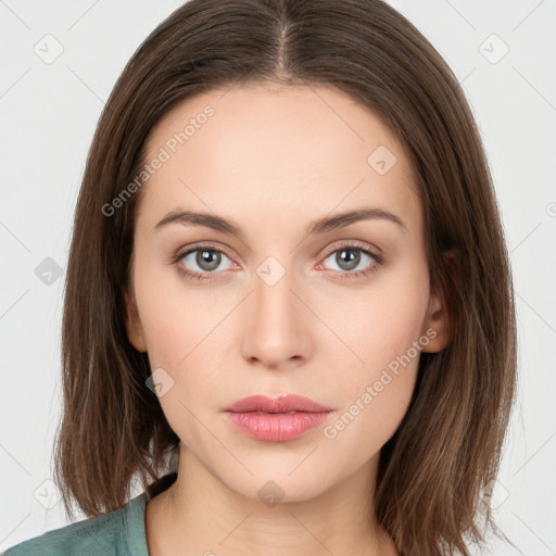 Neutral white young-adult female with medium  brown hair and grey eyes