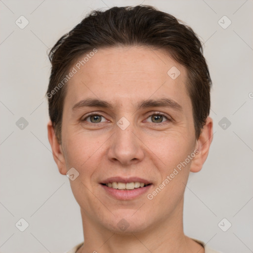 Joyful white adult male with short  brown hair and grey eyes