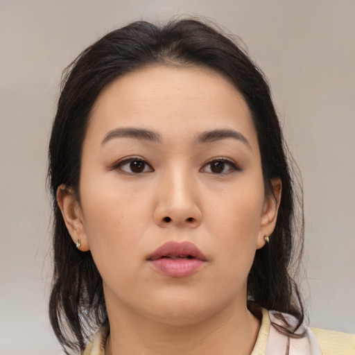 Neutral asian young-adult female with medium  brown hair and brown eyes