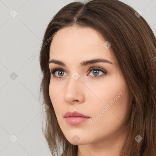 Neutral white young-adult female with long  brown hair and brown eyes