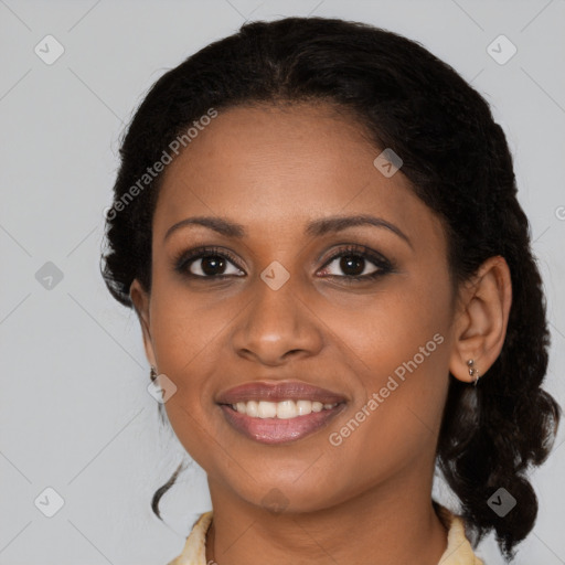 Joyful black young-adult female with medium  brown hair and brown eyes