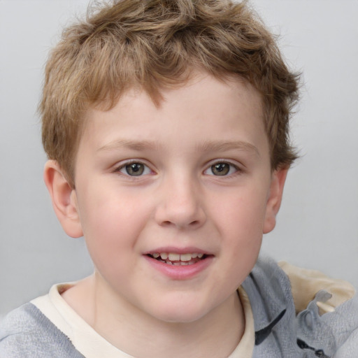 Joyful white child male with short  brown hair and grey eyes