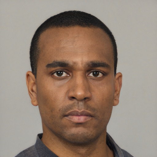 Neutral black young-adult male with short  black hair and brown eyes