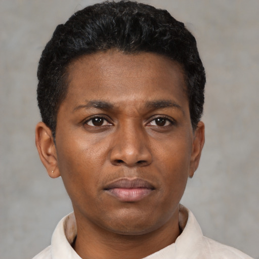 Neutral black young-adult male with short  black hair and brown eyes