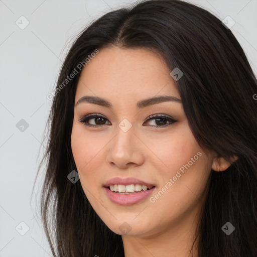 Joyful asian young-adult female with long  brown hair and brown eyes