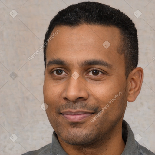 Joyful latino young-adult male with short  black hair and brown eyes