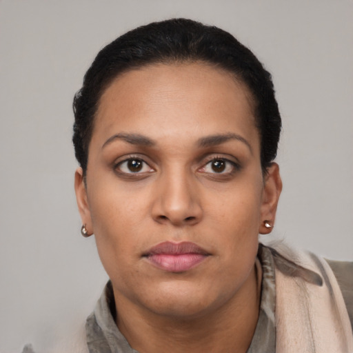 Neutral latino young-adult female with short  black hair and brown eyes