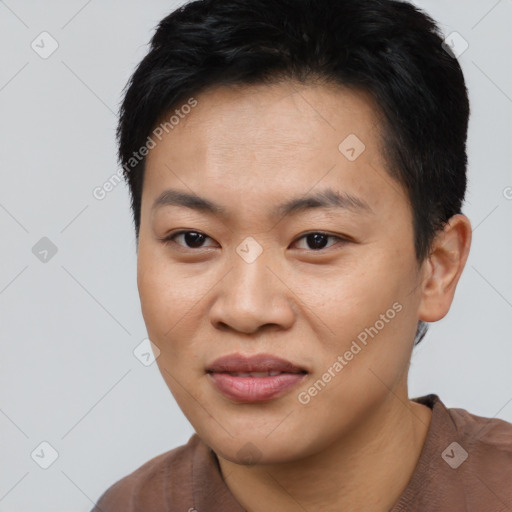 Joyful asian young-adult female with short  brown hair and brown eyes