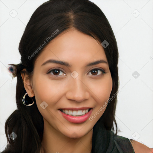 Joyful latino young-adult female with long  brown hair and brown eyes