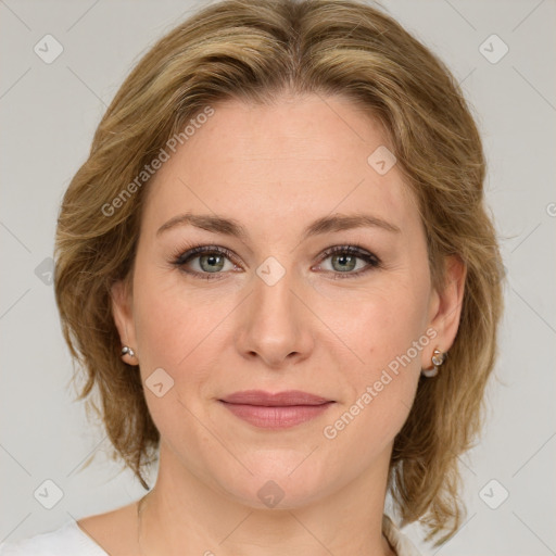 Joyful white young-adult female with medium  brown hair and green eyes