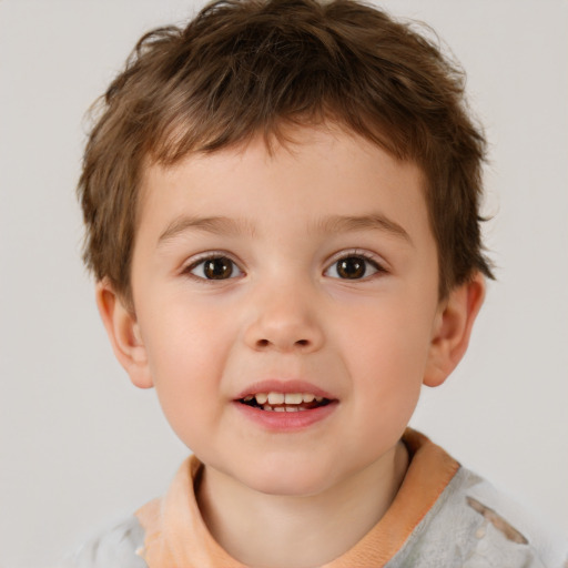 Joyful white child male with short  brown hair and brown eyes