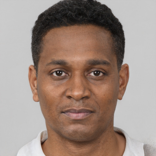 Neutral black young-adult male with short  black hair and brown eyes