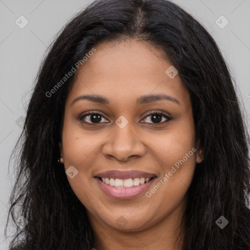 Joyful latino young-adult female with long  brown hair and brown eyes