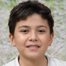 Joyful white child male with short  brown hair and brown eyes