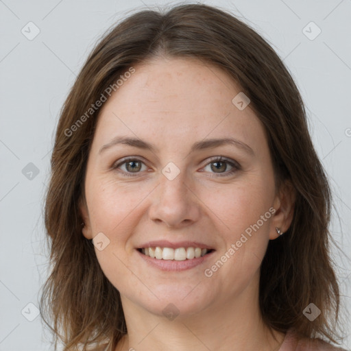 Joyful white young-adult female with long  brown hair and grey eyes